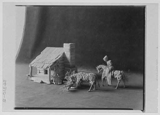 Rural arts exhibition held under the auspices of the Farm Security Administration (FSA) in the patio of the U.S. Department of Agriculture building. Corn husk figures by Mrs. Rosalie Pless of Russellville, Tennessee; mountain home