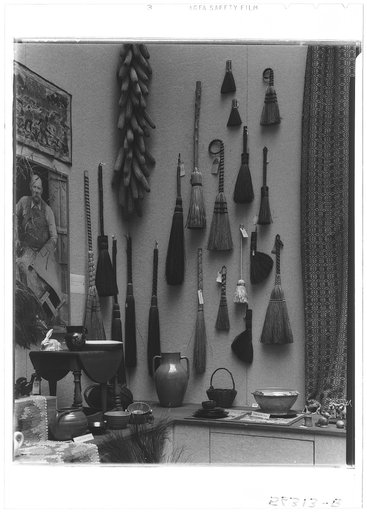 Rural arts exhibition held under the auspices of the Farm Security Administration (FSA) in the patio of the U.S. Department of Agriculture building. Hearth brooms from Southern Highlands; wall hanging from Delaware; table from New Hampshire; pottery from Piedmont, North Carolina, section and New Ham