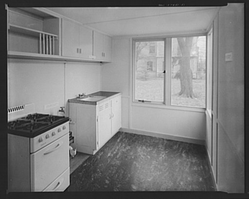 Houses for Britain. Kitchen of prefabricated model house erected by the Federal Public Housing Authority at Scott Circle, Washington, D.C. of the type of temporary, emergency dwelling which it is planned to ship to Great Britain under lend-lease. Doors of china cabinet and below sink to be omitted. 