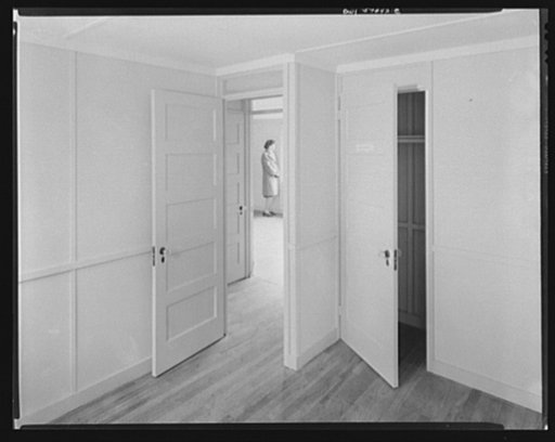 Houses for Britain.  Washington, D.C., February - March, 1945. Sample prefabricated house at Scott Circle, a public park area. 30,000 similar housing units (two bedrooms, kitchen, bath) are intended for shipment to Great Britain. Interiors, showing construction and facilities, before furnishing