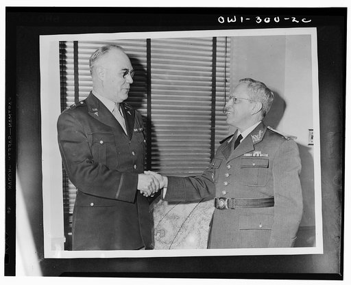 Washington, D.C. Major General James C. Magee, Surgeon General of the U.S. Army, greeting Surgeon General J.A. de Souza Ferreira, of the Brazilian army, who flew to Washington for conference