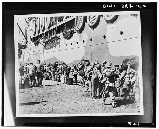 American troops boarding a transport which will take them from New Caledonia to the Solomon Islands battlefront