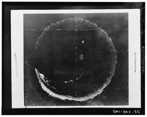 Japanese plane carrier circling to avoid attack by United States airmen at Midway, as seen from a B-17 American bomber
