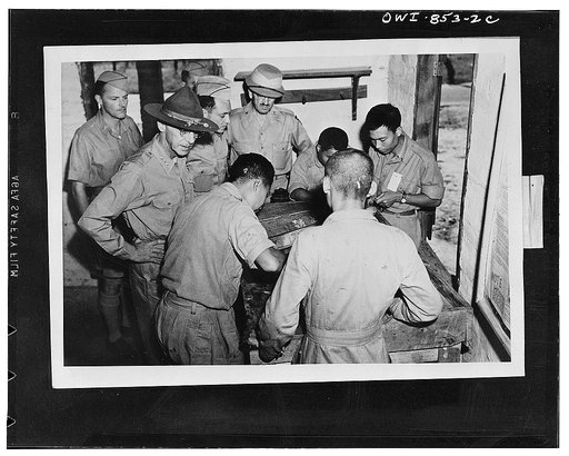 Lieutenant-General Stilwell inspecting a motor school at the Chinese-American training center. Left to right: Colonel Frank Dorn, aide-de-camp to Lieutenant-General Stilwell; Lieutenant-General Stilwell; Lieutenant-Colonel Stevenson, in charge of the motor school and Colonel Geroge W. Sliney, chief 