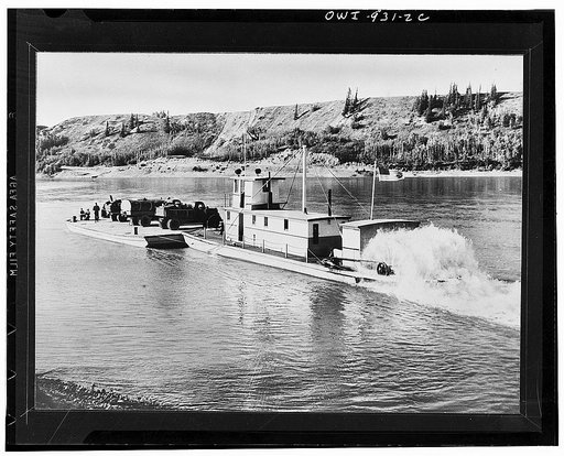Edmonton (vicinity), Canada. 1942. Supplies for building the Alcan Highway being transported stern-wheeler