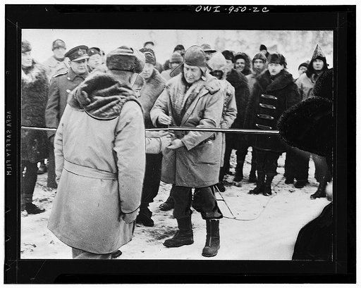 Opening ceremonies of the Alcan Highway at Soldiers' Summit, a stretch of the highway 1500 feet above the wide swath of Kluane Lake, which is approximately 100 miles east of the Alaskan-Yukon international boundary