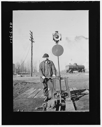 Daniel Senise throwing a switch while at work in an Indiana Harbor Belt line railroad yard