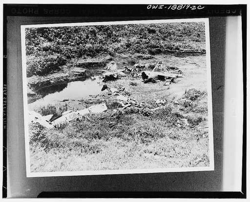 Lae, New Guinea. A United States Army Air Force A-20 attack plane pilot swooped down to within sixty feet of the ground to get this aerial view of smashed enemy planes. More than fifty Japanese planes, destroyed by Allied bombing and strafing raids, littered the airfield after the Allied attack. In 