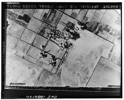 Tripoli, Libya. Daylight raid by Allied air forces on the Castel Benito airdrome, resulting in great damage to machine shops shown at the scene of the airdrome and other installations