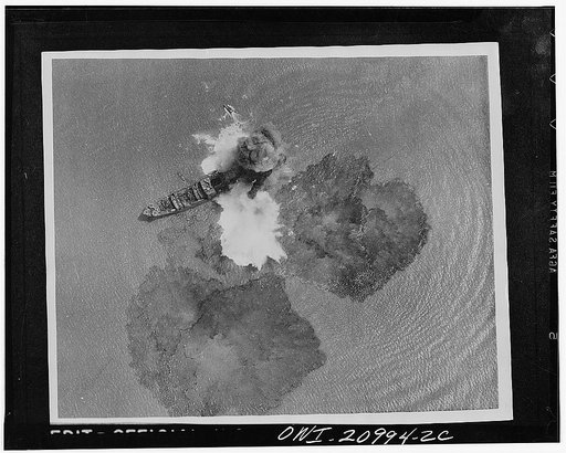 A direct hit on a 7,000 ton Japanese merchant vessel by India Air task forces near Rangoon, India