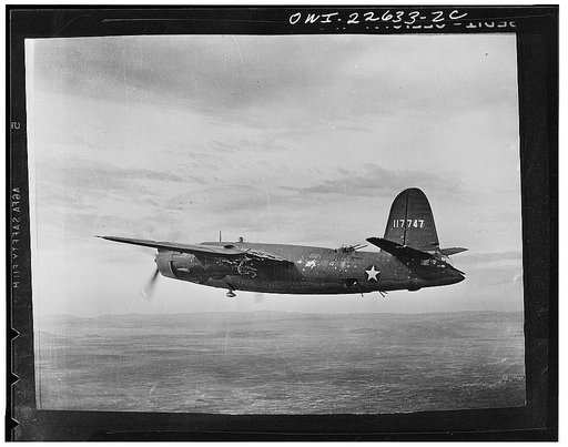 Her left wing and engine nacelle riddled by anit-aircraft fire, this B-26 (Martin Marauder) of the United States Army Air forces flies back and makes a safe belly landing after a bombing raid in Tunisia