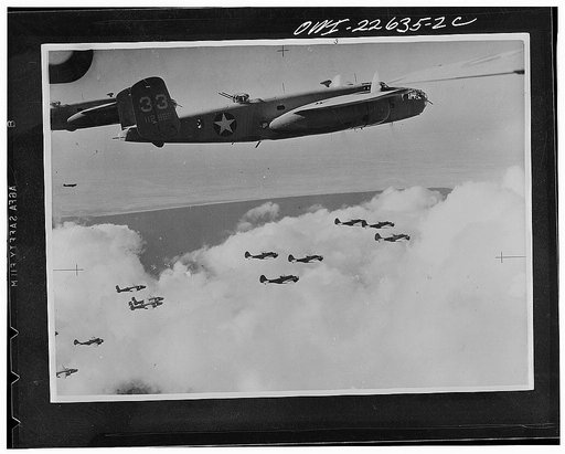 Operations in North Africa by Allied air forces. Mitchell B026 bombers of the United States Army Air Forces and Baltimore bombers of the South African air forces flying together in formation on their way to attack Rommel's position in North Africa