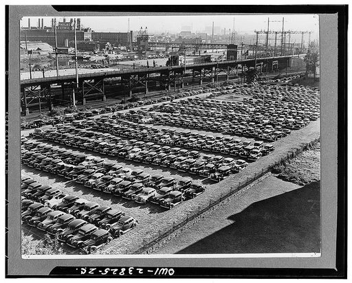 Philadelphia, Pennsylvania. Cars parked in outdoor lot in industrial section