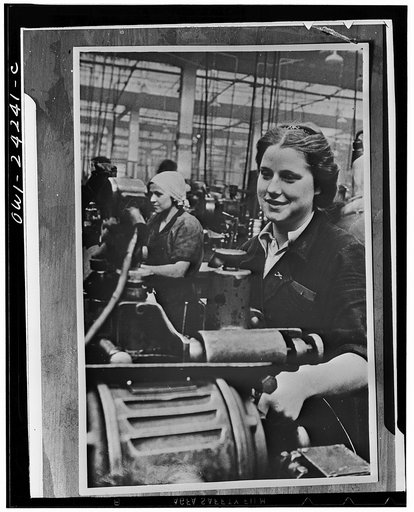 Women handling lathe in a factory in the USSR (Union of Soviet Socialist Republics)