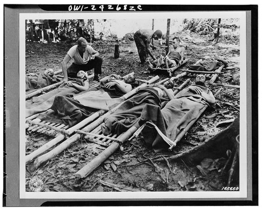Wounded American soldiers given medical attention in New Guinea