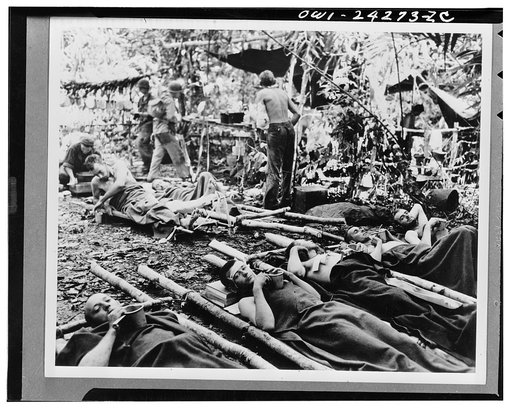 Wounded waiting at a portable hospital for evacuation. Australia