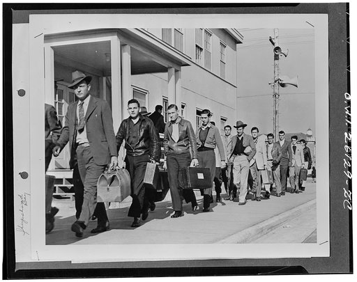 Sheepshead Bay, New York. Enrollees from all parts of the country shown arriving at the United States Maritime Service training station, the largest of its kind in the world. When dedicated on December 12 the station will have 10,000 apprentice seamen in training for the American Merchant Marine