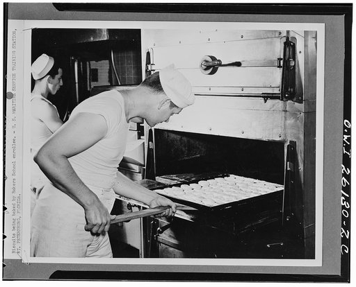 Saint Petersburg, Florida. Biscuits being baked by Bakers school enrollee at the United States Maritime service training station