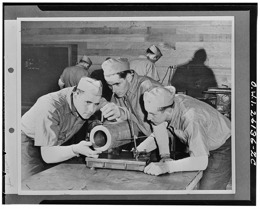 San Mateo, California. Cadets get instruction in the use of hand tools at the United States Merchant Marine cadet basic school