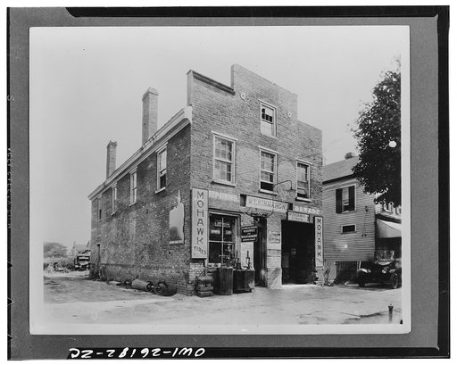 Williamsburg, Virginia. The capitol of the Virginia colony during the eighteenth century which was reconstructed and restored to its original state by John D. Rockefeller Jr. during the 1930s. The sign of the Golden Ball, erected between 1720 and 1735, before restoration