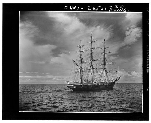 Apprentice seamen in the United States Maritime Service manning the yards on the square-rigged training ship "Joseph Conrad"