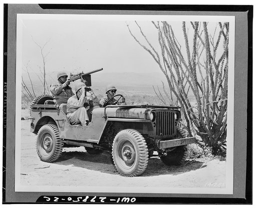 Indio, California. Jeep and crew on a reconnaisance patrol in the desert of the desert training center
