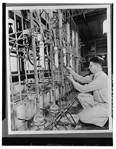 Control laboratory. Shown here are the distillation units in the control laboratory where various tests are made in the production of butadiene