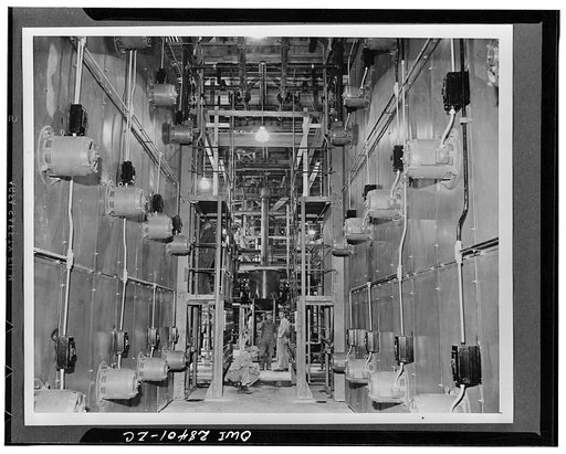 Drying. Synthetic rubber is dried by passing back and forth three times in giant driers, each capable of handling 3,000 pounds of rubber an hour, at the Institute plant. Each drier is equipped with thirty-three fans, and 140 tons of water are evaporated every day