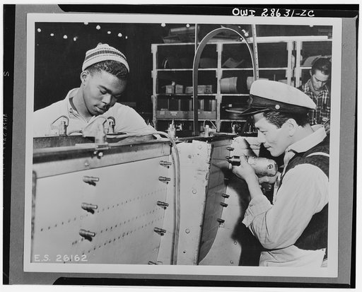 The six plane factories of the Douglas Aircraft Company have been termed an industrial melting pot, since men and women of fifty-eight national origins work side by side in pushing Americas's plane output. S. O. Porter, Douglas director of personnel, recently declared that Negros are doing an outsta