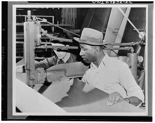 The six plane factories of the Douglas Aircraft Company have been termed an industrial melting pot, since men and women of fifty-eight national origins work side by side in pushing Americas's plane output. S. O. Porter, Douglas director of personnel, recently declared that Negros are doing an outsta