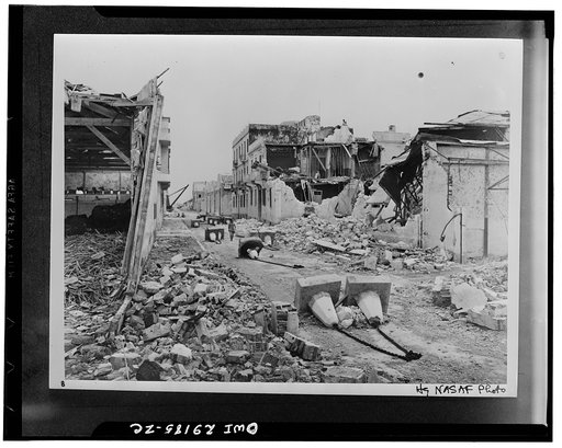 Sousse, Tunisia. A building which received a direct hit in a raid over the town by bombers of the Northwest African Strategic Air forces before the Germans and Italians retreated. The enemy had placed tank obstructions in the street