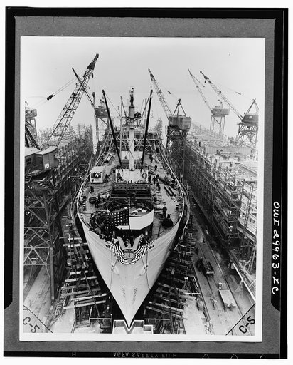 Bethlehem Fairfield shipyards, near Baltimore, Maryland. Construction of a Liberty ship. On the twenty-fourth day the ship is ready for launching. The christening platform is in place