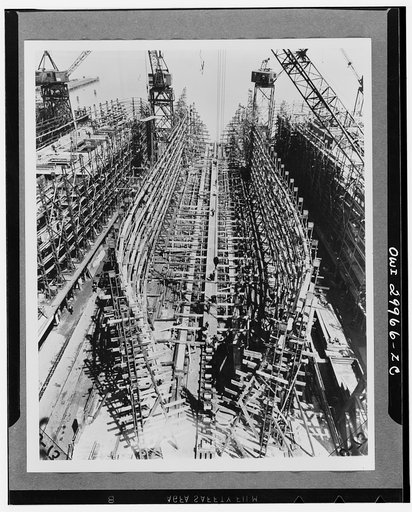 Bethlehem Fairfield shipyards, near Baltimore, Maryland. Construction of a Liberty ship. Laying of the keelplates to which will be attached the vertical keel