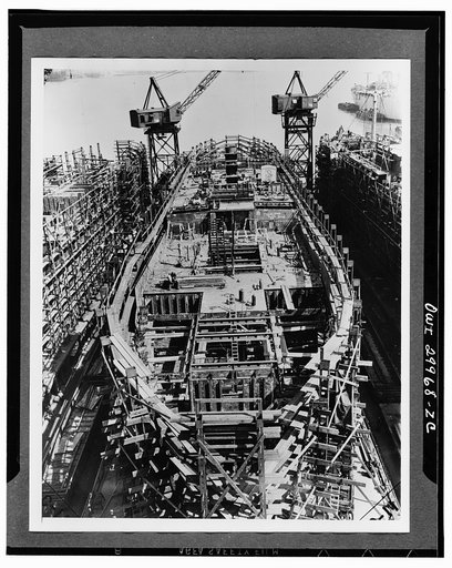 Bethlehem Fairfield shipyards, near Baltimore, Maryland. Construction of a Liberty ship. On the tenth day 1575 tons of ship are in place. The lower deck is being completed and the upper deck amidship is erected with the inner stack installed