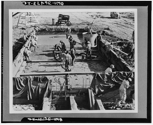 Hermiston, Oregon. Pouring concrete in the construction of igloo number 5E34 at the Umatilla ordnance depot