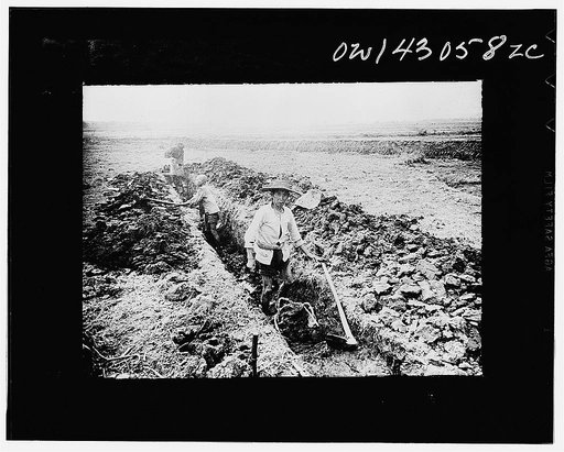 Public Health Service Investigation Commission to the China-Burma highway, Chefang (vicinity), China. Early stage in digging the seepage ditch in the Old Fort area