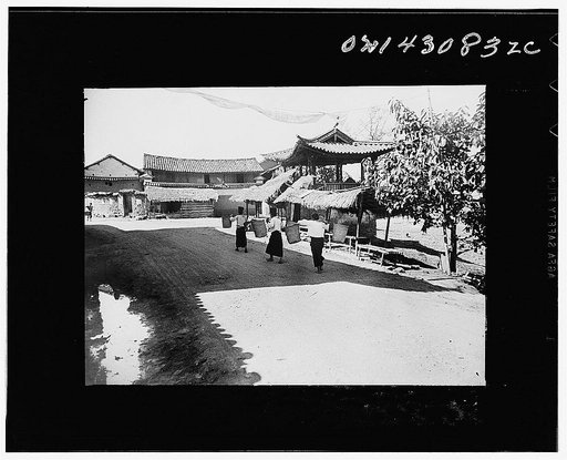 Public Health Service Investigation Commission to the China-Burma highway, Chefang, China. A street scene