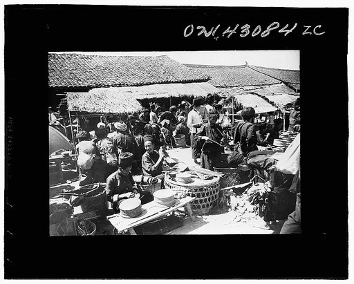 Public Health Service Investigation Commission to the China-Burma highway, Chefang, China. A market place