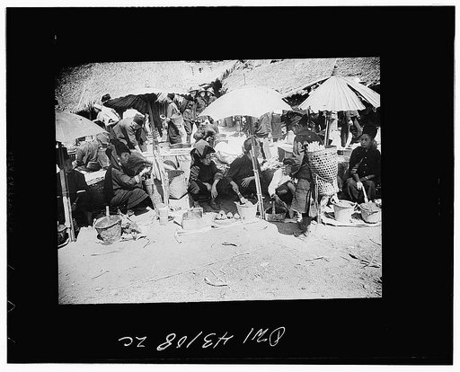 Public Health Service Investigation Commission to the China-Burma Highway, Chefang, China. The market place. Shans are selling bettlenut and lime, the local chewing tobacco
