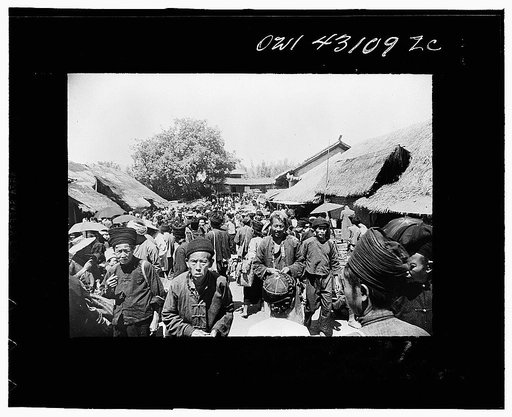 Public Health Service Investigation Commission to the China-Burma Highway, Chefang, China. Market day