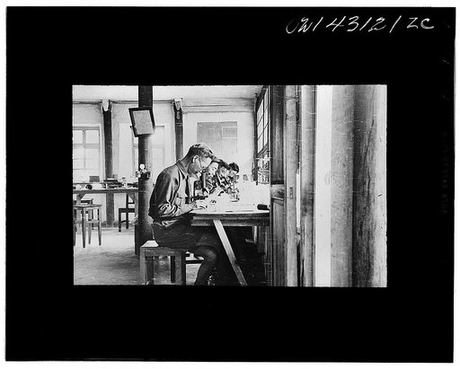 Public Health Service Investigation Commission to the China-Burma Highway, Chefang, China. Thick film examination in the laboratory. The blood rates in winter are over fifty-eight percent