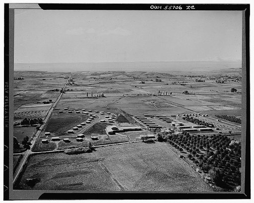 Granger, Washington. Air view of the Farm Security Administration (FSA) camp and homes. The community and school building is in the center