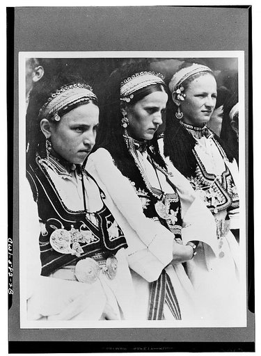 Three girls in national costumes from Croatia