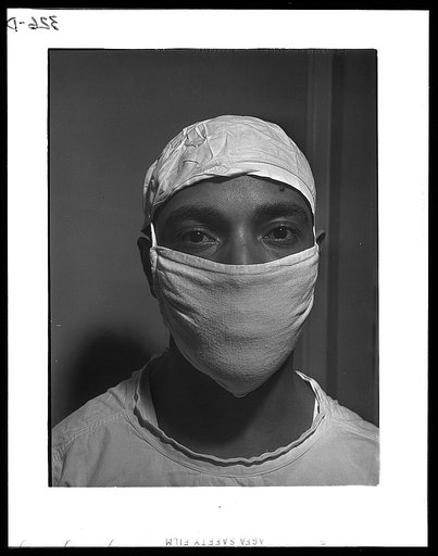 Chicago, Illinois. Provident Hospital. Dr. S.J. Jackson, intern, ready to go into the operating room to assist in an operation