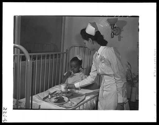 Chicago, Illinois. Provident Hospital. Lunch time in the children's ward