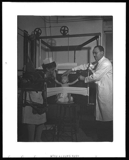 Chicago, Illinois. Provident Hospital. Baby being x-rayed