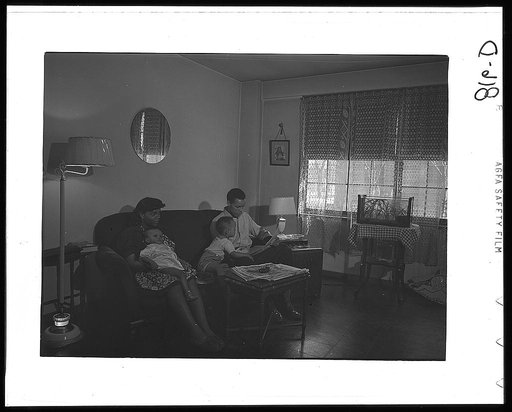 Chicago, Illinois. Ida B. Wells Housing Project. Family of Mr. Edward Vaughn living in one of the apartments. Mr. Vaughn is doing work for the War Department