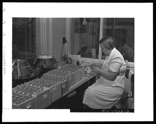 Labeling bottled vaccines. USPHS (United States Public Health Service)  Rocky Mountain Laboratory. Hamilton, Montana
