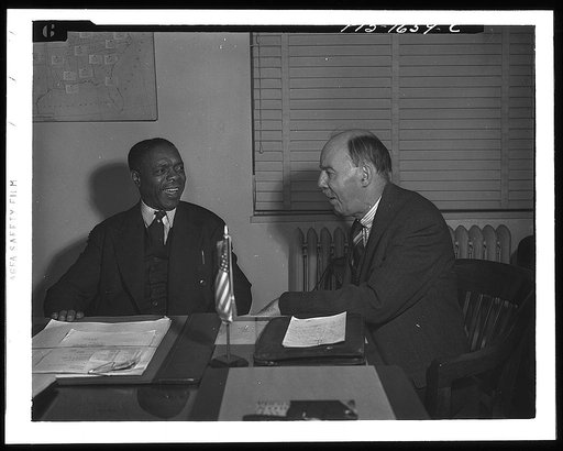 Washington, D.C. Dean William Pickens and James L. Houghteling of the United States Treasury Department. Houghteling is director of the Division of National Organizations