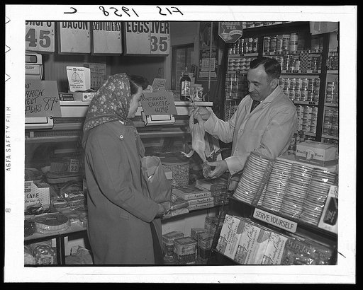 Provincetown, Massachusetts. Mrs. John Russe shopping in a Portuguese store
